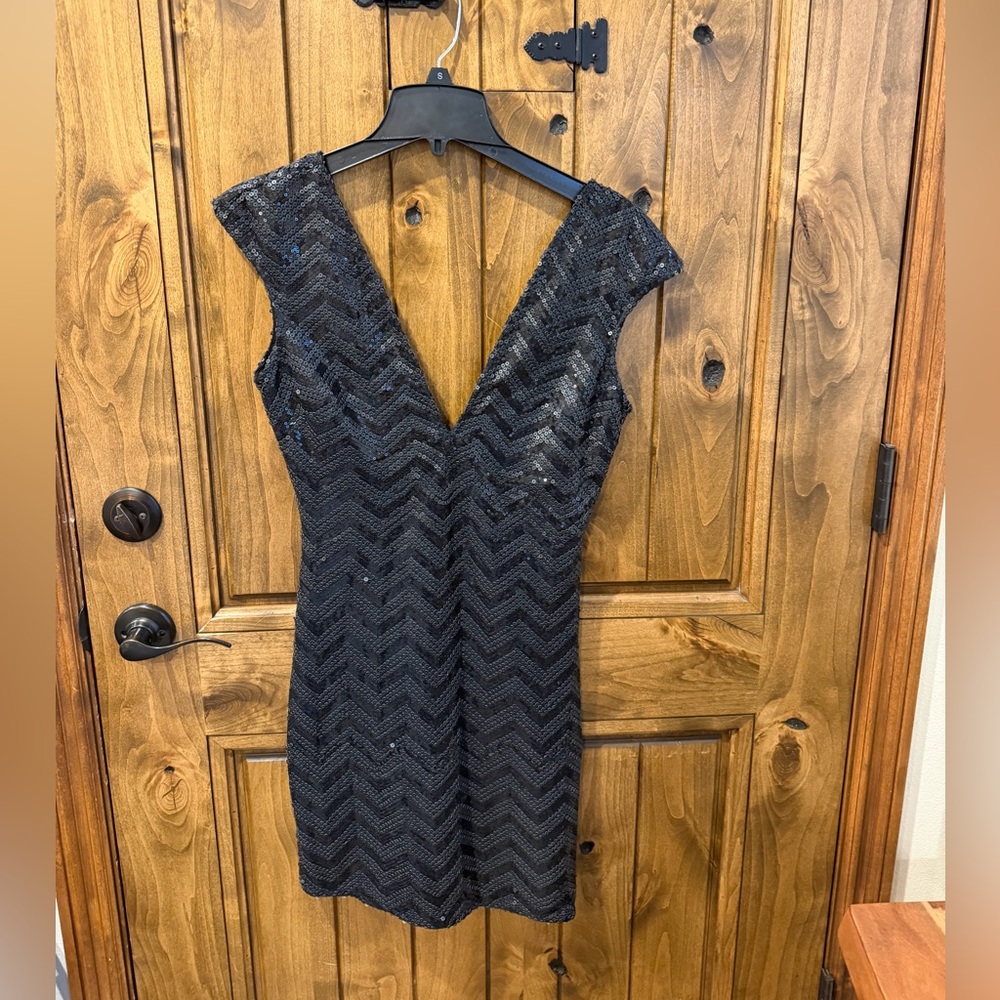 Lovers and Friends Elegant Black Sequin Dress
Size Medium